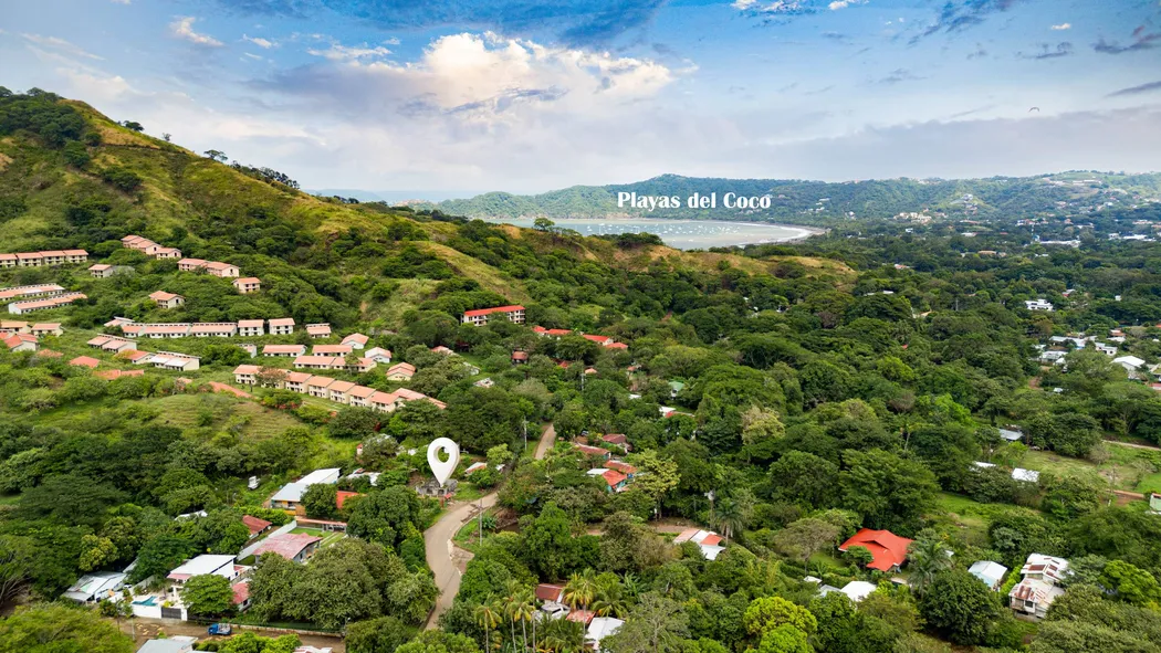 Aerial view of the hillside road toward Playas del Coco, near the lot