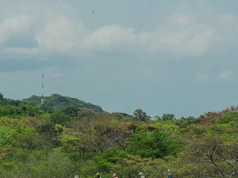 Hikers on a volcanic trail near Rincón de la Vieja
