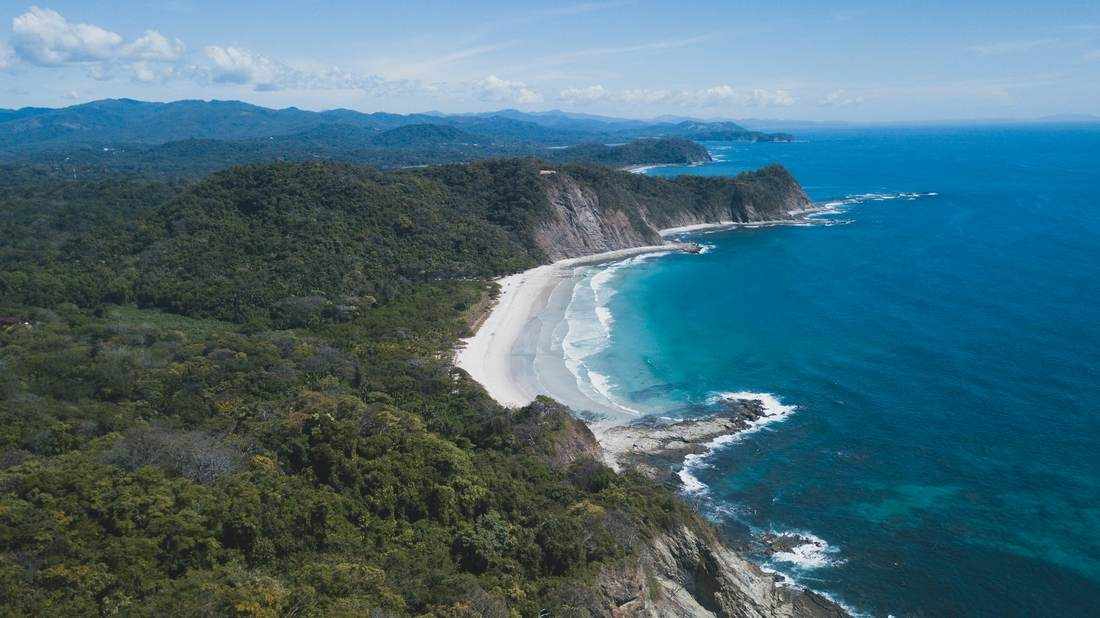 Aerial view of Playa Ocotal's cove and coastline